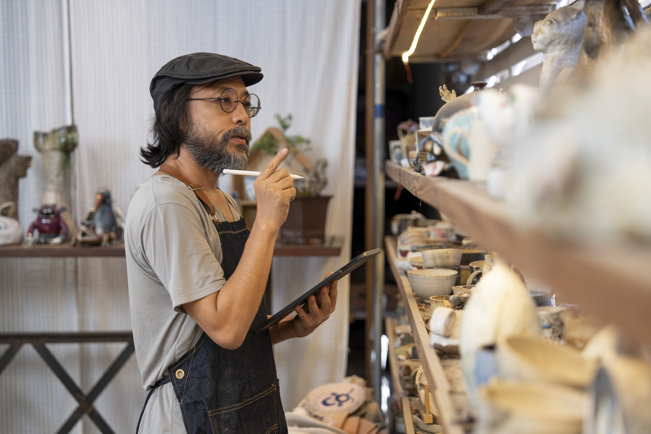 A man checking stock on a shelf